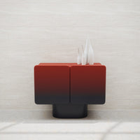 Red and black gradient modern accent table with stylish decorative elements. Perfect for contemporary interiors.