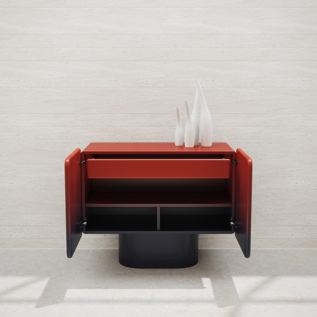 Modern red and black cabinet with sleek lines and glossy finishes, featuring open storage compartments.