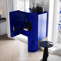 Bold blue cabinet with glossy finish, round base, and modern geometric design, perfect for contemporary interiors.