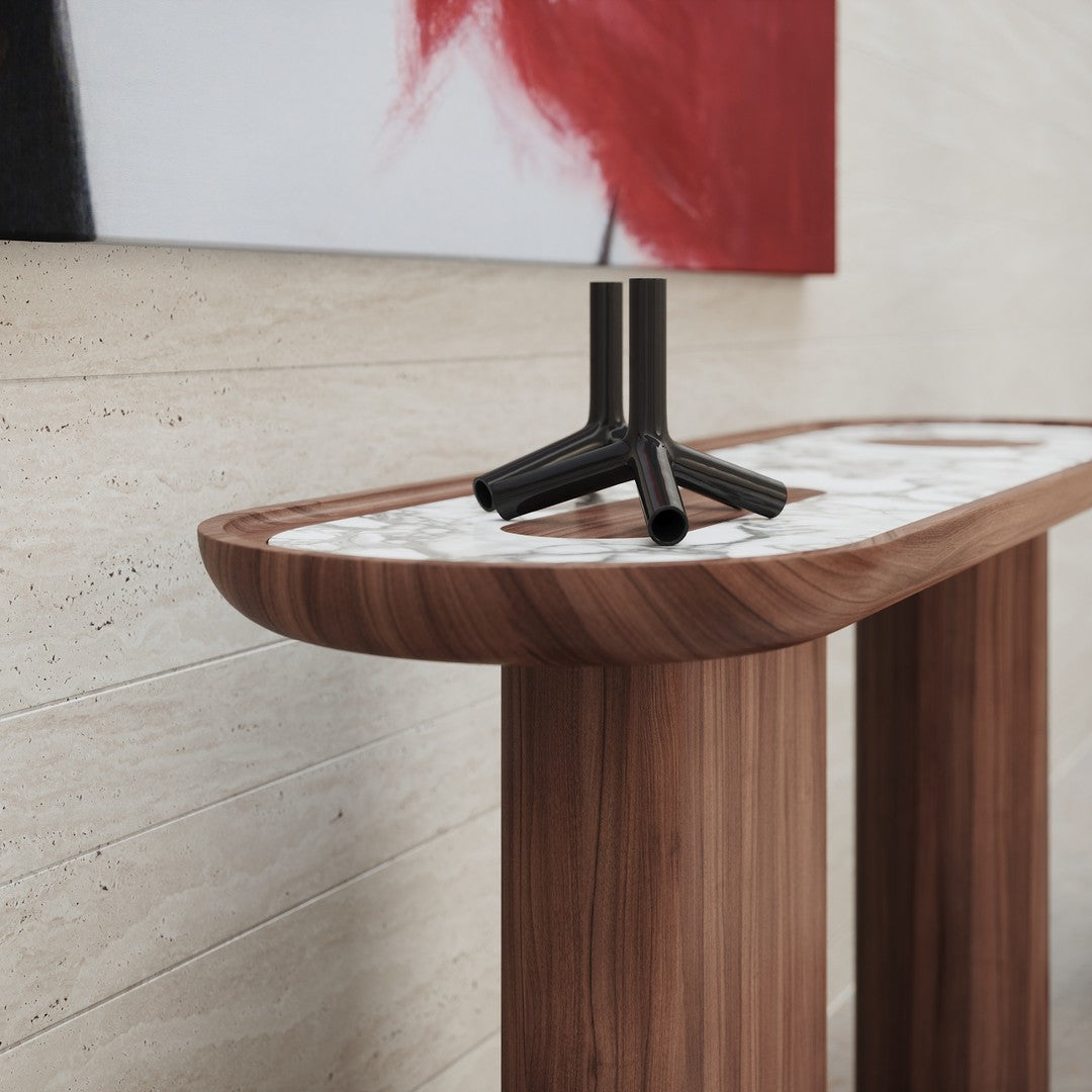 Wooden console table with a curved top, featuring a marble pattern in white with subtle gray veining and a black base.