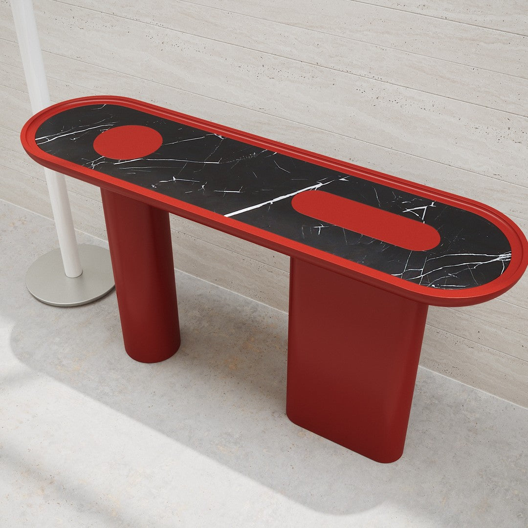 Red and black striped console table with a marble top featuring circular patterns and bold, modern design.