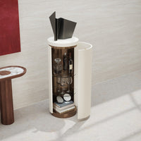 Modern bar cabinet featuring cream and dark wood colors with sleek black geometric accents and a circular design.