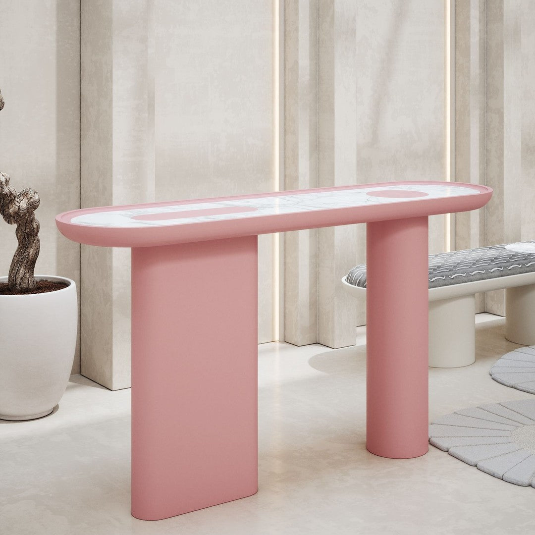 Pink modern console table with a smooth surface and minimalist design, featuring two cylindrical legs.