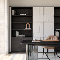Modern office setup featuring dark wood shelves, a sleek black desk, and a textured white cabinet with minimalistic patterns.