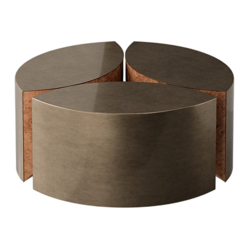 Triangular three-piece coffee table with a sleek gray finish and natural cork accents. Modern minimalist design.