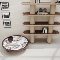 "Modern shelf with beige and walnut colors, featuring a round marble-patterned coffee table with deep purple accents."