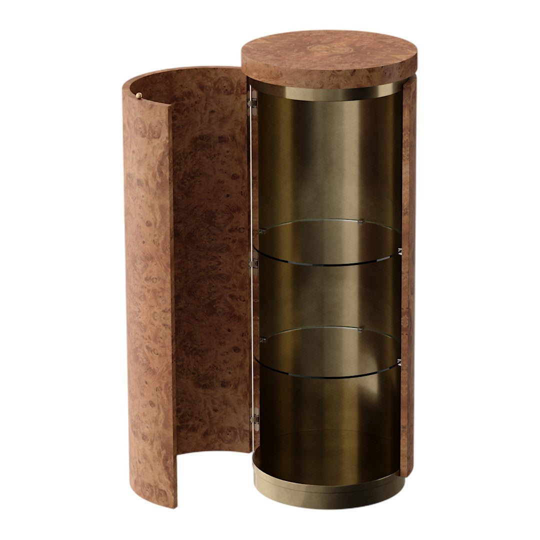 Round storage unit with a warm brown cork exterior and shiny brass interior, featuring two glass shelves.