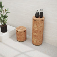 Natural cork storage containers with a smooth texture, featuring a light brown hue and subtle organic patterns.