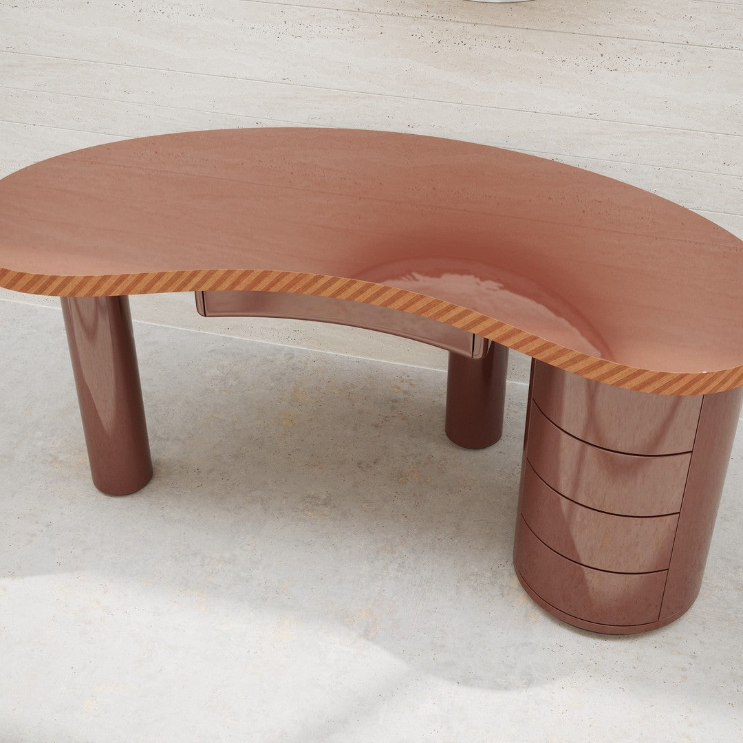 Curved brown desk with glossy finish and striped wooden accents, featuring sleek, cylindrical storage base.