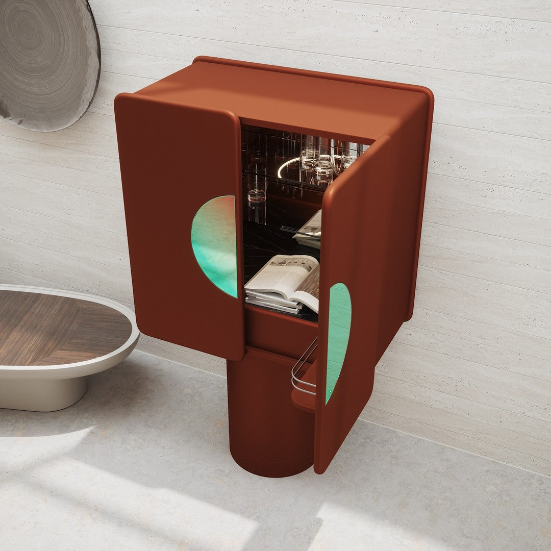 Modern red mini fridge with green circular accents and sleek design, perfect for contemporary interiors.