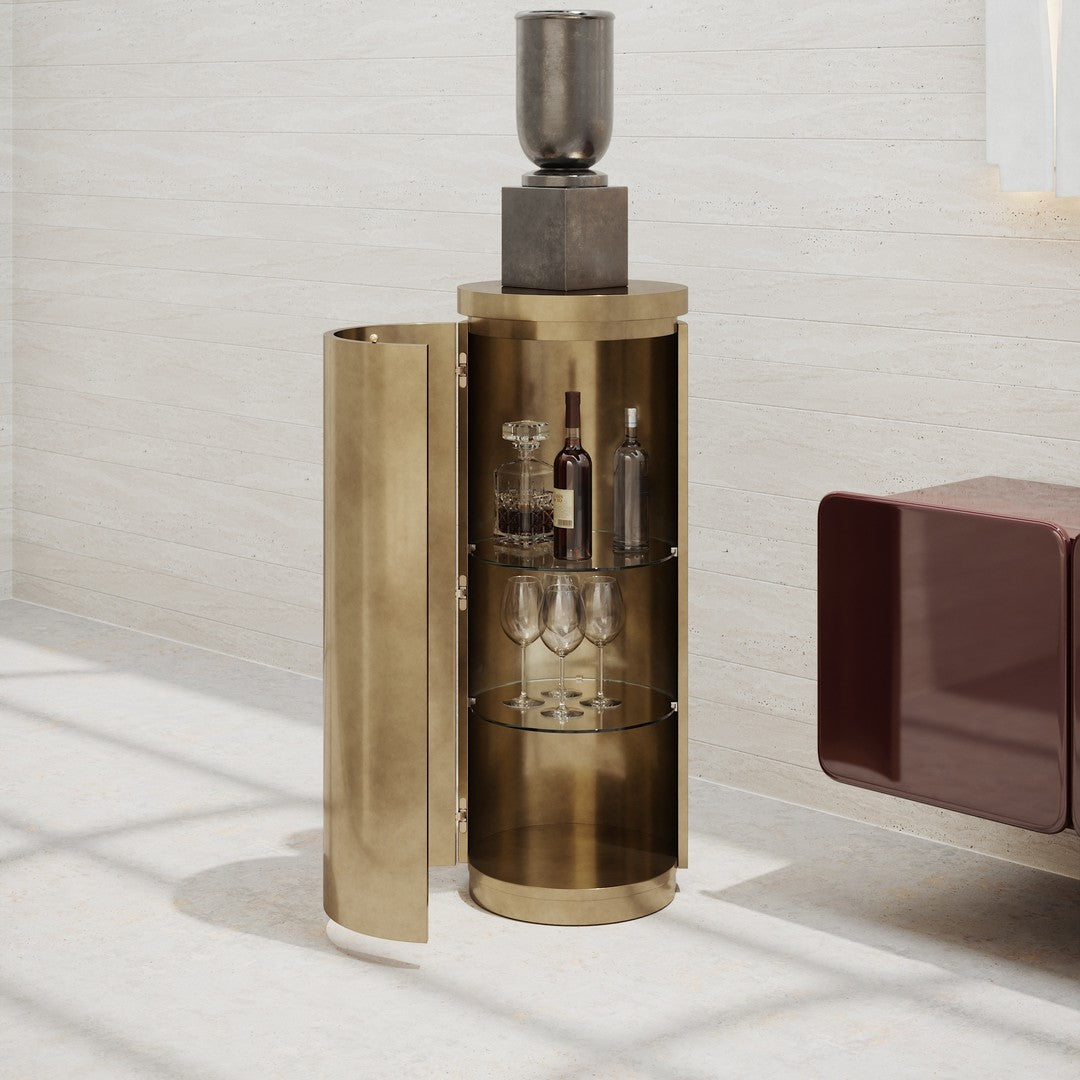 Elegant gold bar cabinet with sleek design, featuring a shiny exterior and glass shelves, perfect for modern decor.