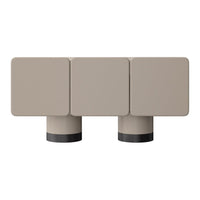 Light beige modular furniture with smooth, square surfaces and dark cylindrical bases for a modern aesthetic.
