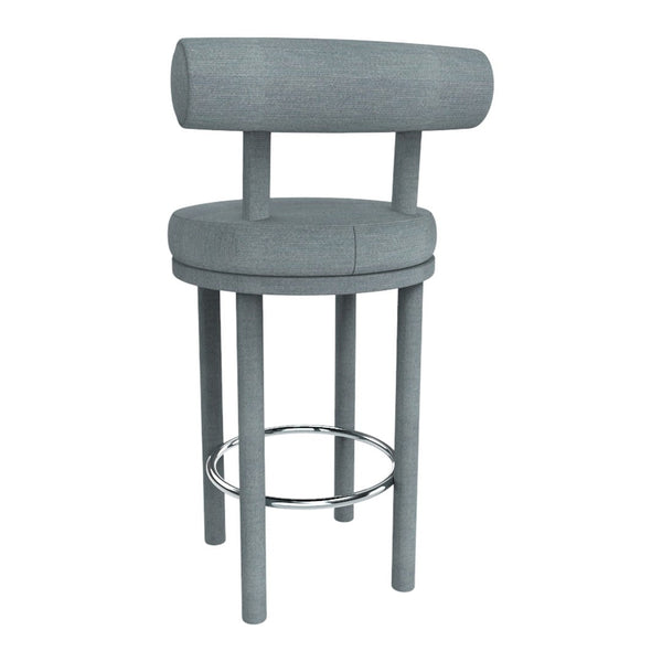 Gray upholstered bar stool with a rounded backrest and chrome footrest, featuring a minimalist design.