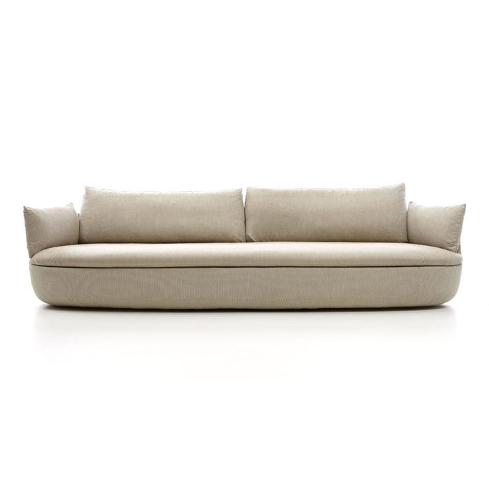 Beige, minimalist sofa with smooth lines and plush cushions for a modern, neutral decor style.