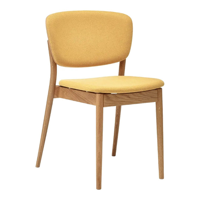 Yellow upholstered chair with a smooth surface, complemented by natural wood legs for a stylish, modern look.