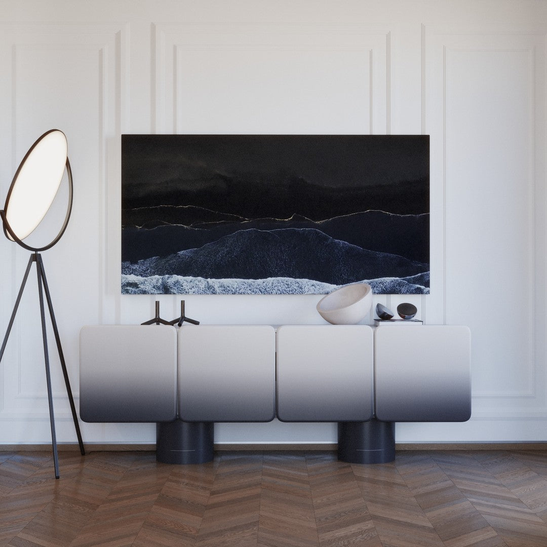 Modern gradient sideboard in soft gray to white, complemented by black accents and sleek lines. Perfect for contemporary interiors.