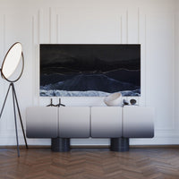 Modern gradient sideboard in soft gray to white, complemented by black accents and sleek lines. Perfect for contemporary interiors.