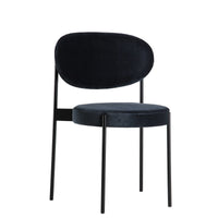 Navy blue velvet dining chair with a sleek black metal frame and modern, minimalist design. Perfect for stylish interiors.