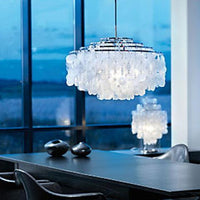 Elegant crystal chandelier featuring a frosted white and clear glass design, complemented by chrome accents.