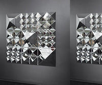 Geometric mirror wall art featuring silver tones and a mix of triangular and diamond patterns. Perfect for modern decor.