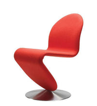 Modern red chair with smooth curves, featuring a sleek metallic base, perfect for contemporary decor.