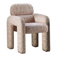 Textured armchair in warm shades of beige and cream, featuring a unique, abstract pattern. Perfect for modern decor.