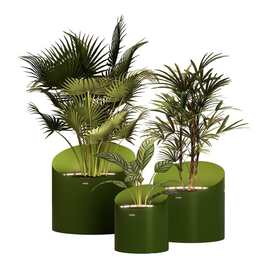 Set of three modern planters in varying shades of green, featuring lush tropical plants and smooth, circular designs.