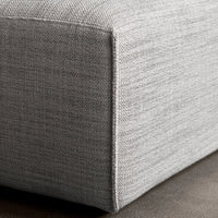 Gray textured fabric corner, showcasing a subtle woven pattern and sleek design. Perfect for modern decor.