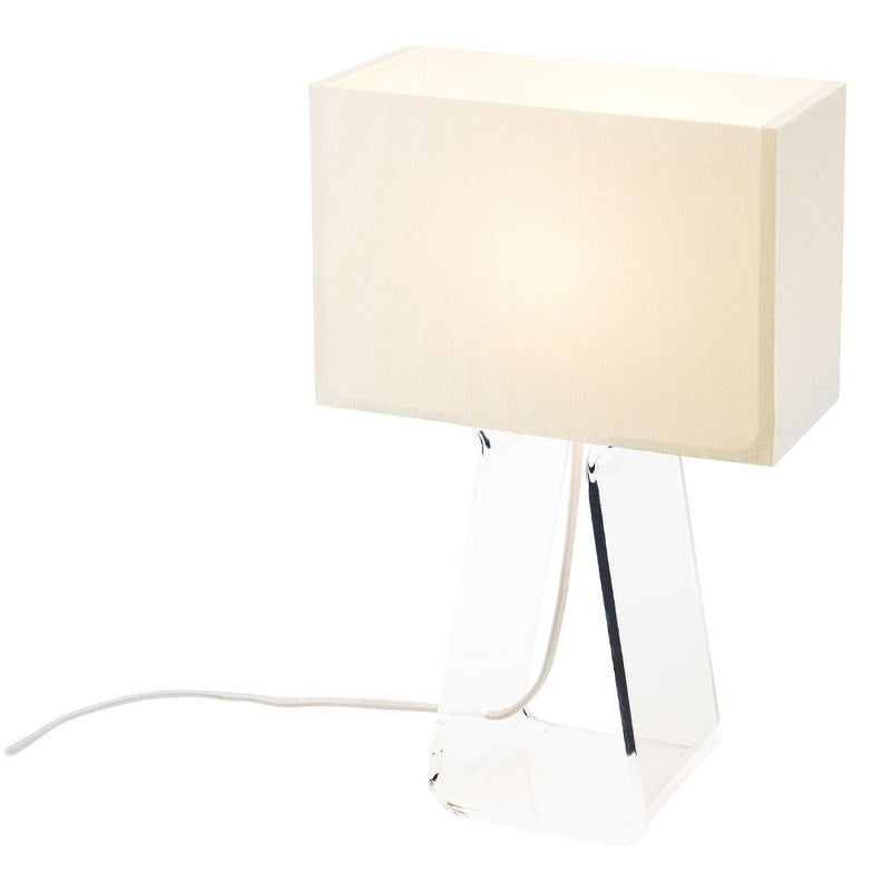 Minimalist white lamp with a sleek, clear base and soft, rectangular fabric shade creating an elegant look.