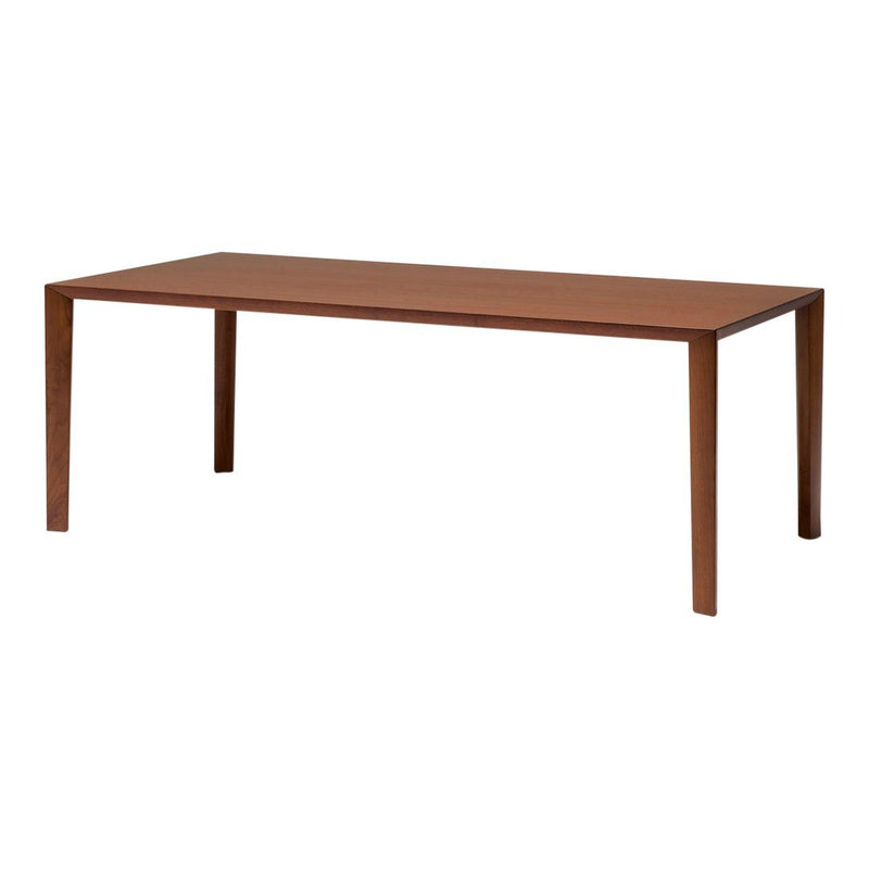 Brown wooden dining table with a smooth, rectangular surface and sleek, minimalist legs. Ideal for modern interiors.