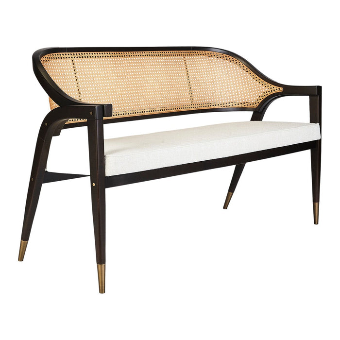 "Elegant black and natural wicker bench with creamy white upholstery and gold accents."