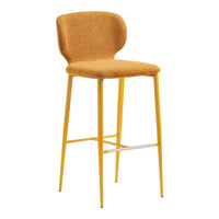 Yellow bar stool with a textured cushion on a white background
