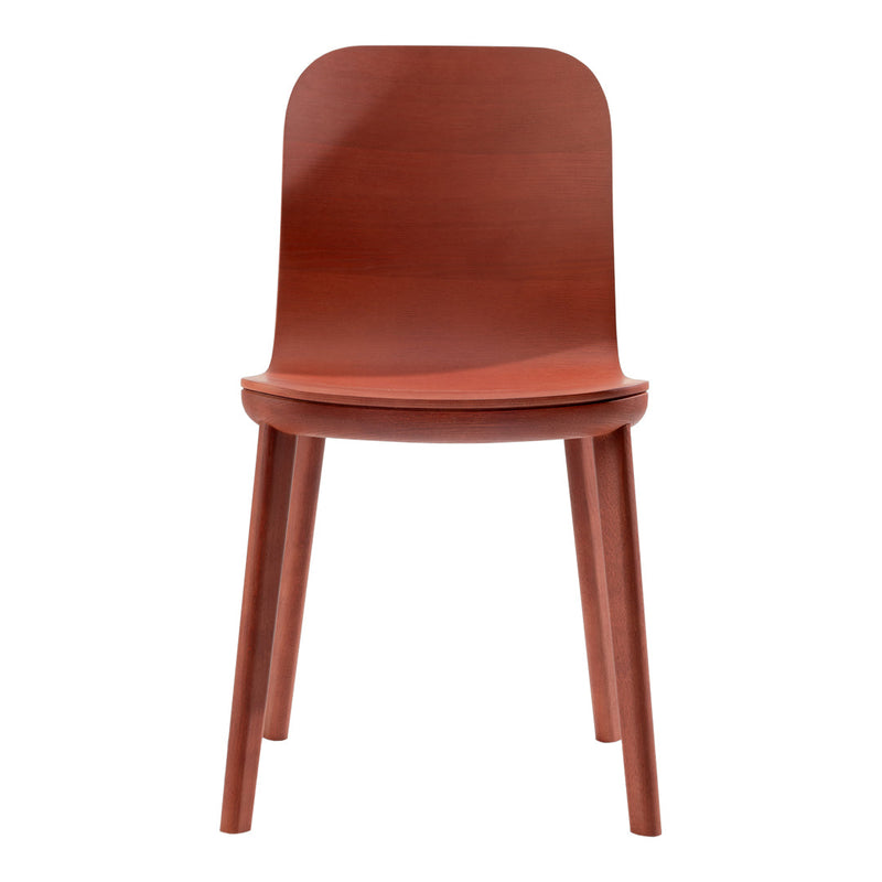 Rust-colored wooden chair with a smooth finish and minimalist design, featuring tapered legs and a curved backrest.