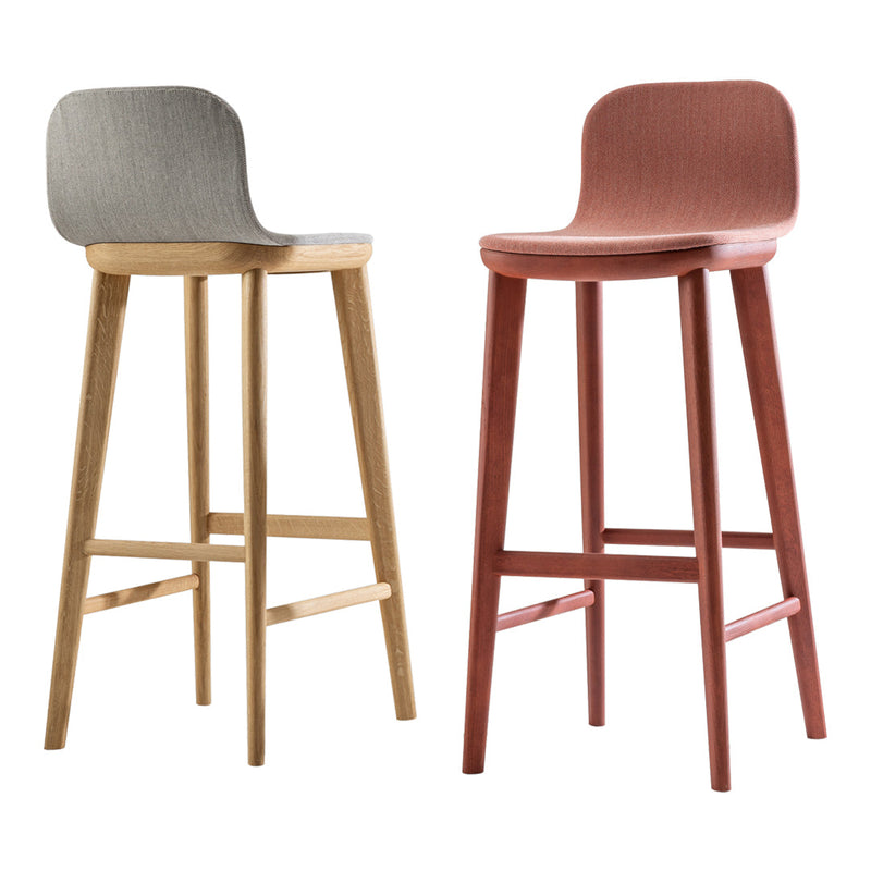 Gray and terracotta fabric bar stools with wood legs, showcasing minimalist design and modern color palette.