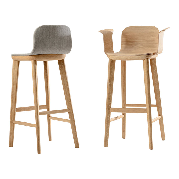 Two modern bar stools with light wood legs and a soft gray patterned seat. Minimalist design for stylish interiors.