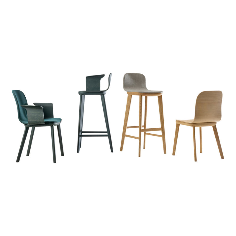 Set of four modern chairs in teal, gray, natural wood, and black finishes, featuring sleek, minimalist designs.