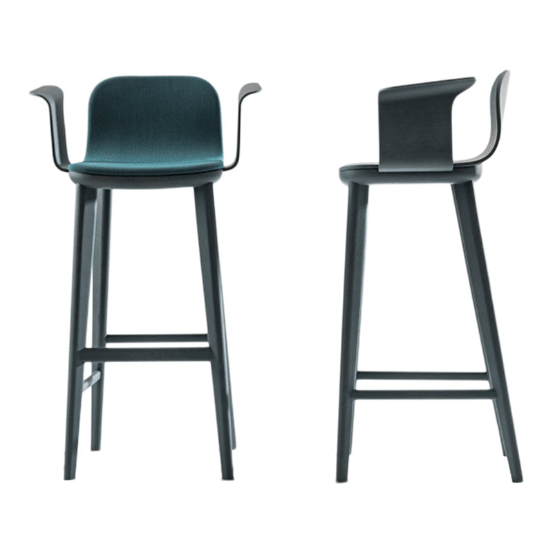 "Modern bar stool featuring a sleek dark green seat and black wooden legs, with minimalist design and curved backrest."