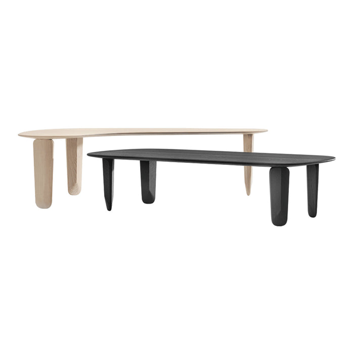 Two modern coffee tables in a minimalist design: one natural wood finish and one sleek black with rounded edges.