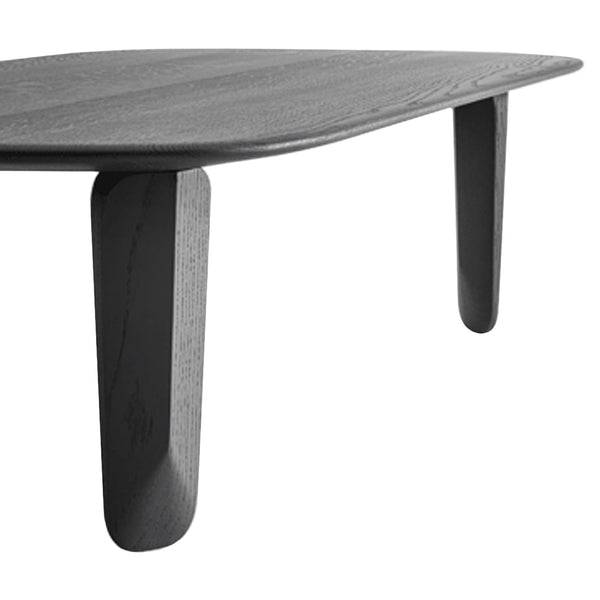 Sophisticated black wooden table with a smooth surface and rounded edges, supported by sturdy, tapered legs.