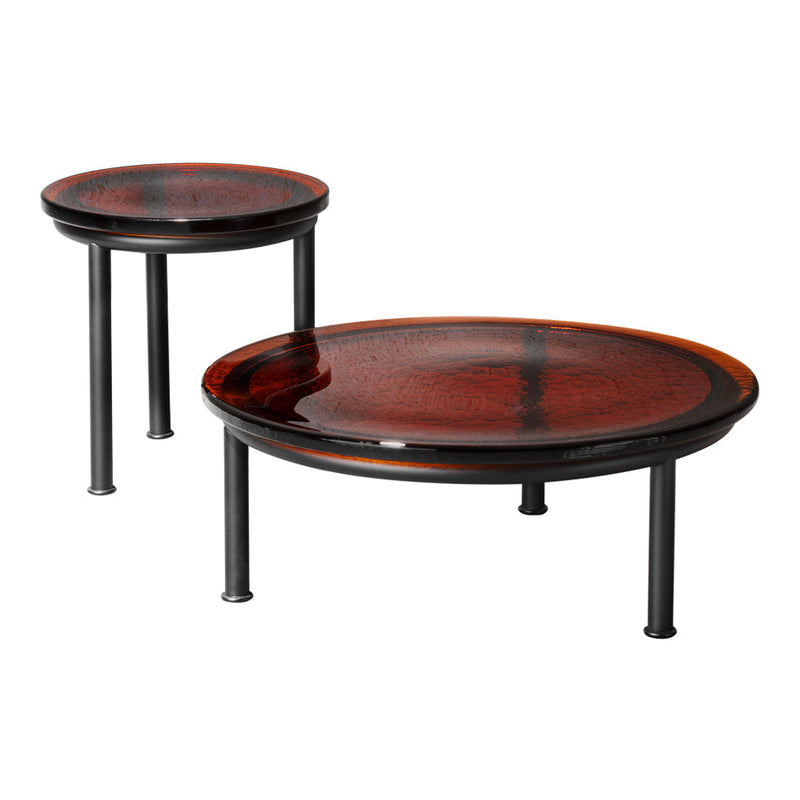 Set of two round coffee tables with a glossy mahogany finish and black metal legs, featuring a smooth, contemporary design.
